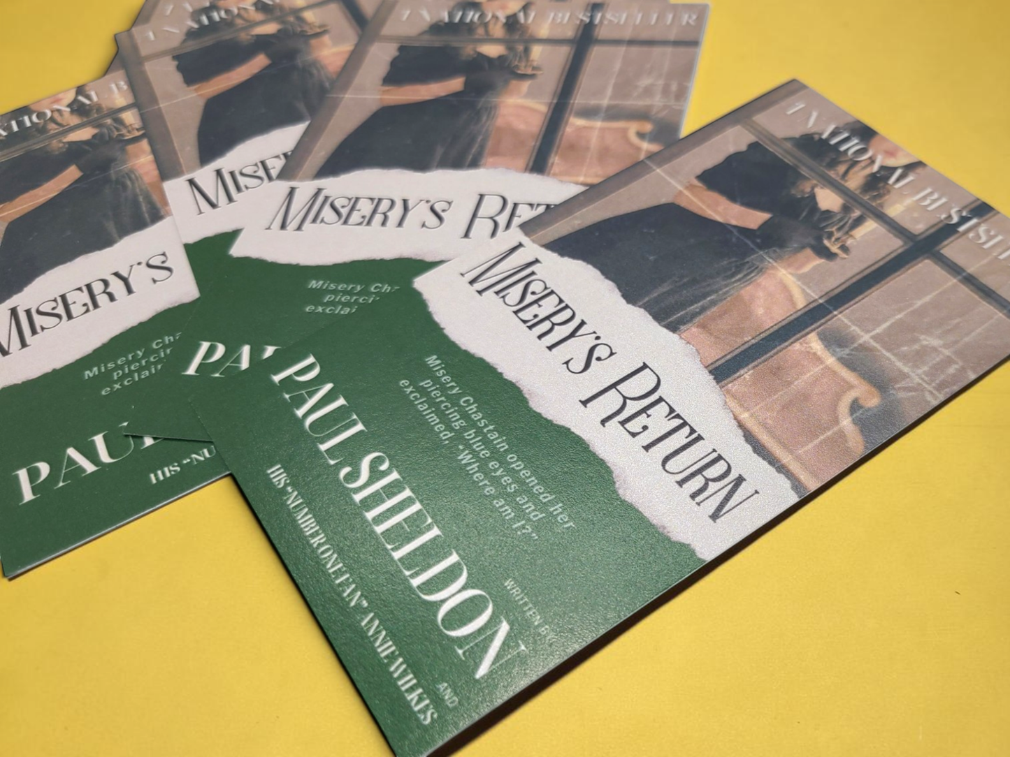 3x5 inch bookmarks designed to look like the cover of a victorian romance novel titled "Misery's Return." Printed on high-quality shimmer 350GSM cardstock.