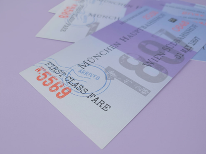 A close-up shot of a thick, double-sided Jonathan Harker train ticket bookmark from Dracula, showing realistic 19th-century vintage typography printed on ultra-heavy cardstock.