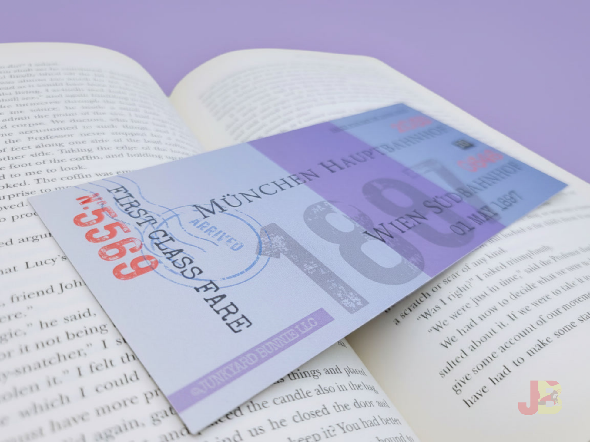 Jonathan Harker train ticket bookmark resting elegantly on top of an open copy of Bram Stoker's gothic horror novel, Dracula.