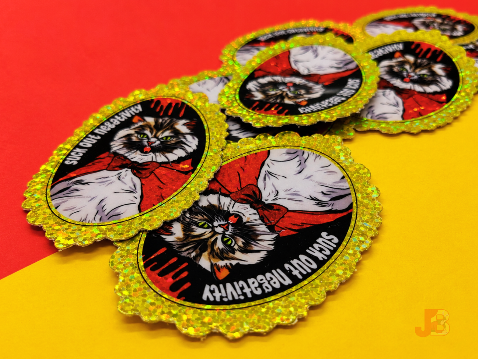 A close-up shot showing the premium glitter sparkle on several vampire Pallas cat stickers.