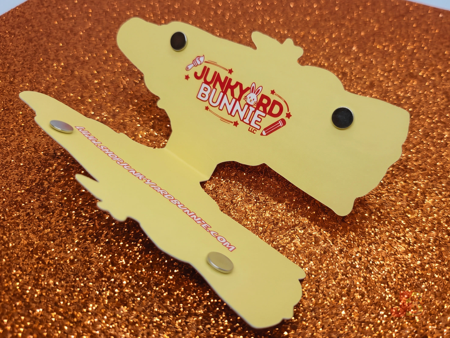 Inside the magnetic bookmark featuring the Junkyard Bunnie logo and website with secure magnets attached.