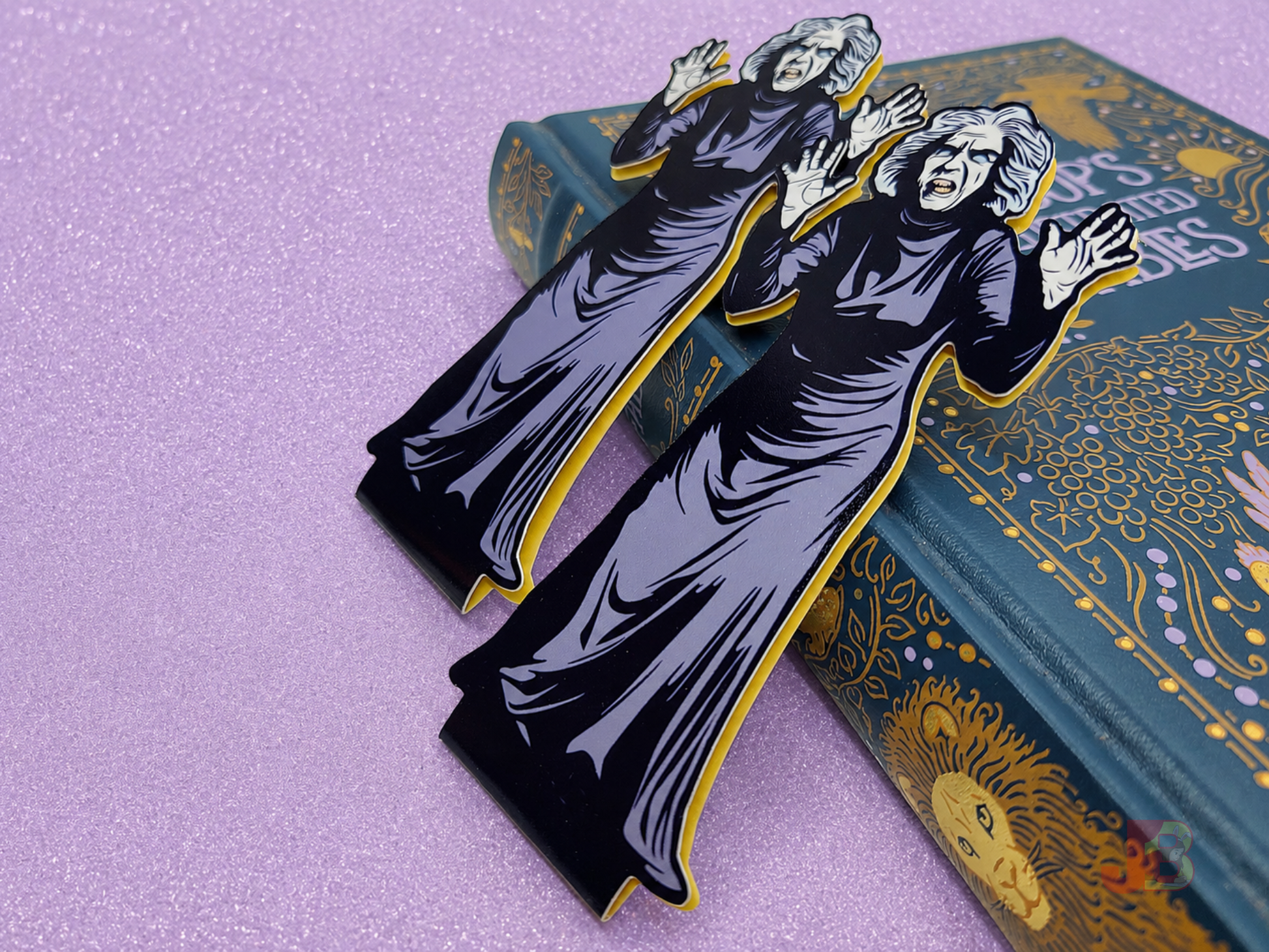 Close-up shots of magnetic bookmarks featuring original art of the creepy old woman from the classic horror movie House on Haunted Hill. The spooky vintage movie art is printed on high-quality coverstock.